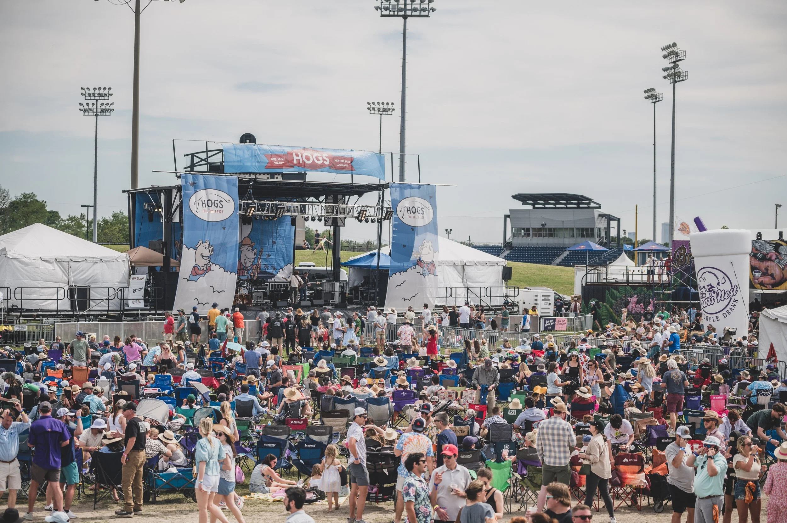 Festival guests moving through a live event environment